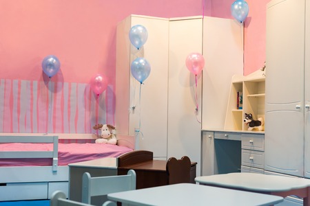 Nice child room interior with balloonsの写真素材