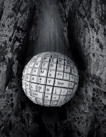 Keyboard in the form of a ball over grayの写真素材