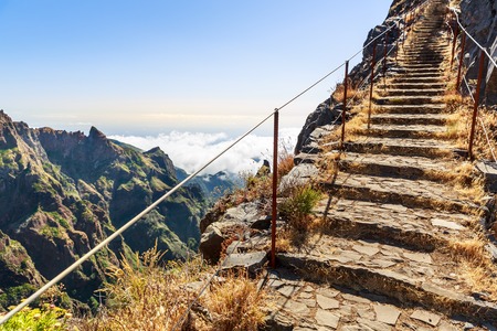 Path with steps and handrails in the mountains, Portugal, Madeira