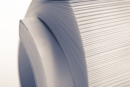 Macro of a rolled catalog. Toned