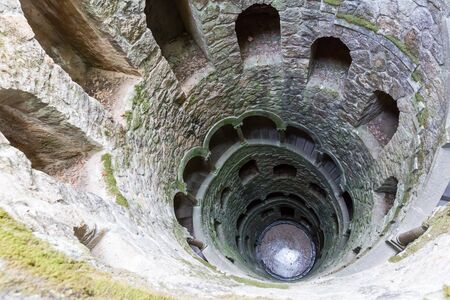 Up view of ancient tower with spiral staircase outdoorの写真素材