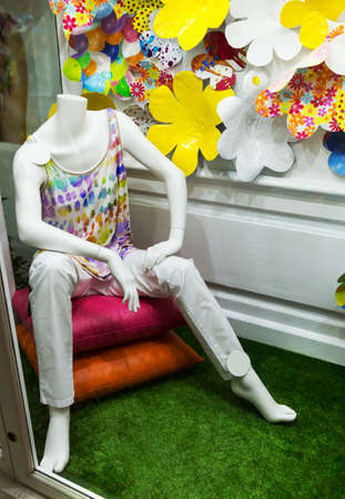 Male mannequin in t-shirt sitting in the shopの写真素材