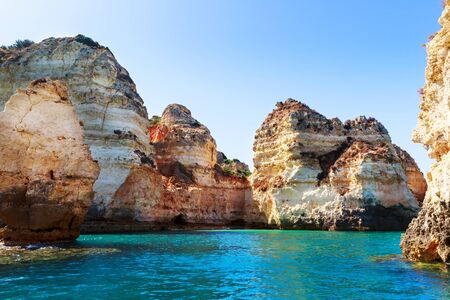 Beautiful picturesque rocky cliffs in the ocean, Portugalの写真素材