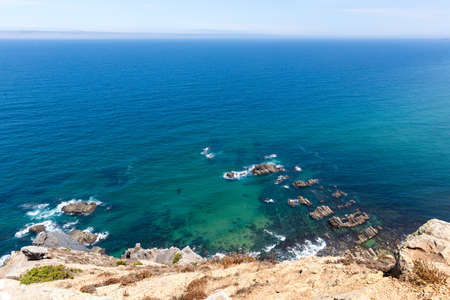 Aerial view of rocky ocean shoreの写真素材