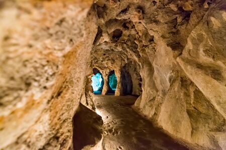 River running in the caves in the forestの写真素材