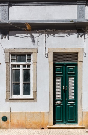 Close up of ragged building with faded paintの写真素材