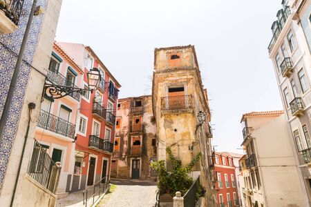 Old dwelling houses jn the narrow european streetの写真素材