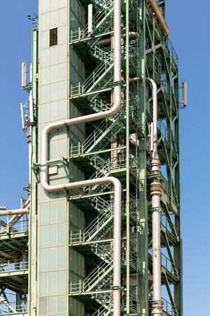 Industrial tower against the skyの写真素材