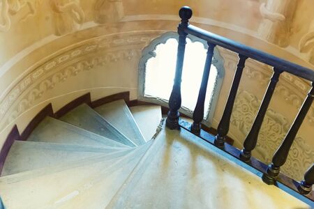Spiral stairs with a little round window