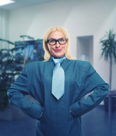 Surprised geek businesswoman in the officeの写真素材