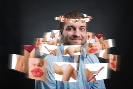 Happy man thinking about womenの写真素材