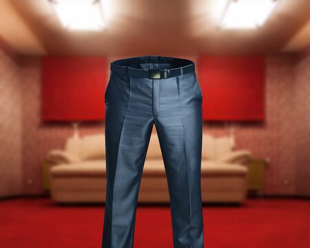 Man's trousers in the roomの写真素材