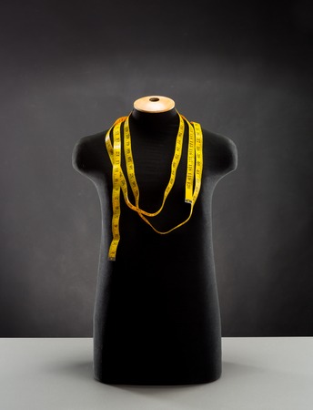 Clothing mannequin with measuring tape on itの写真素材
