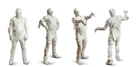 Four men in toilet paper isolated on white