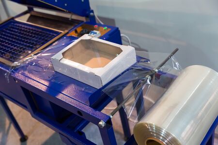 Box and buckram on the packing machineの写真素材