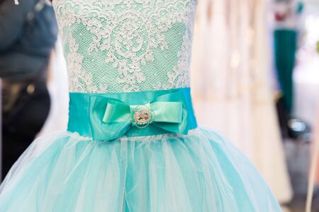 Beautiful modern dresses on the mannequins in the shopの写真素材