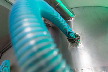 Metal pipe on the ceiling closeupの写真素材