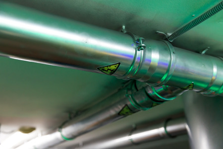 Metal pipe on the ceiling close up