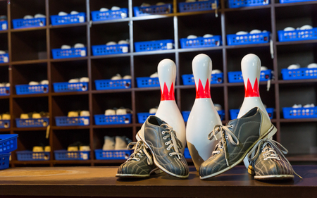 Bowling shoes and pins close upの写真素材