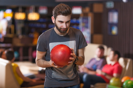 Portrait of a bearded man with bowling ballの写真素材