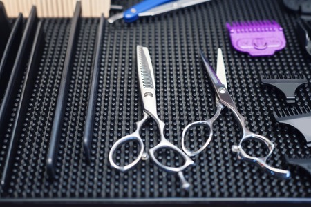 Close up of modern barber's tools on the tableの写真素材