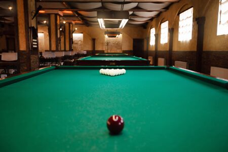 Billiard table with balls prepared for playの写真素材