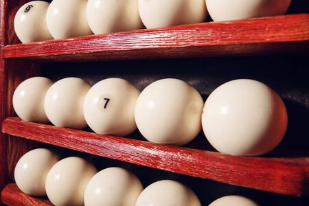Billiard balls on the shelves close upの写真素材