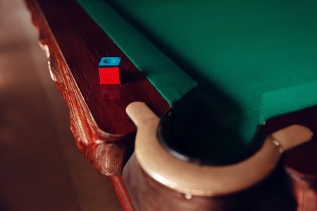 Close up of billiard pocket and chalkの写真素材