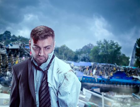 Close up of businessman after wreckage standing over plane ruins