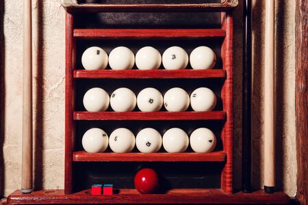 Billiard balls on the shelves close upの写真素材