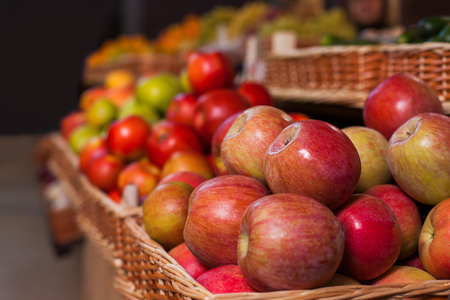 Wicker boxes with ripe apples. Ecological food. Healthy lifestyle.の写真素材