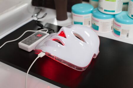 Light photodynamic rejuvenating mask for facial skin therapyの写真素材