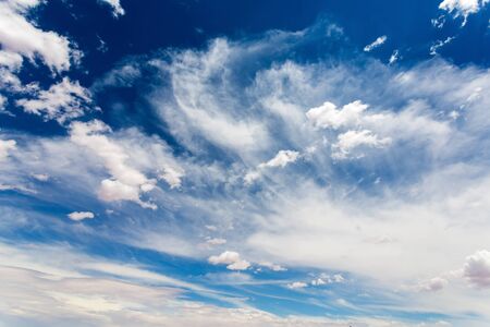 Cloudscape on deep blue sky.の写真素材