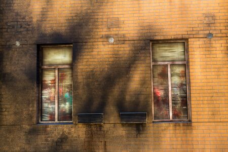Grunge brick wall with window.