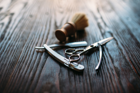 Shaving and barber equipment on wooden backgroundの写真素材