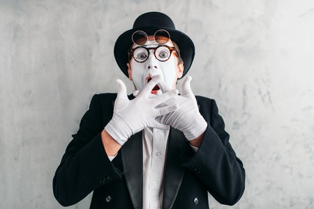 Funny mime actor with makeup maskの写真素材