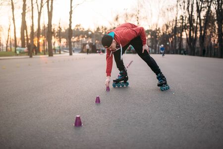 Roller skater in skates, balance exerciseの写真素材