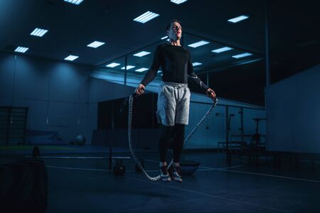 Active man on training, workout with rope