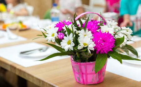 Fresh flower bouquet decorated with basket