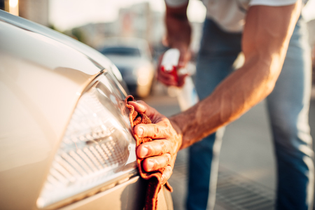 Tail lights polishing on car wash stationの写真素材