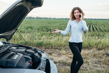 Woman calls to emergency service, broken car