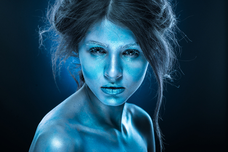 Fantasy woman with blue frost makeup and skinの写真素材