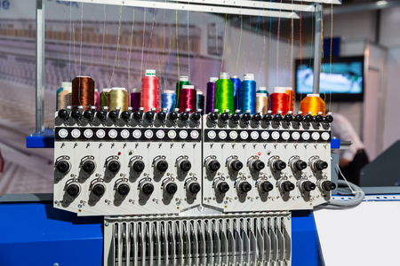 Sewing machine with spools of thread closeupの写真素材