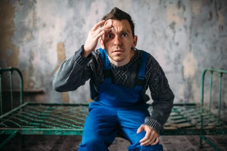 Madman, mouth sealed with plaster, psycho patientの写真素材