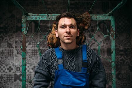 Madman, opened eyelids sealed with plaster, psychoの写真素材