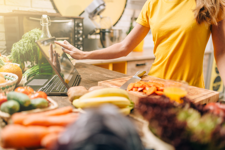 Female person cooking on the kitchen, healthy foodの写真素材