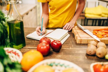 Female person cooking on the kitchen, bio foodの写真素材