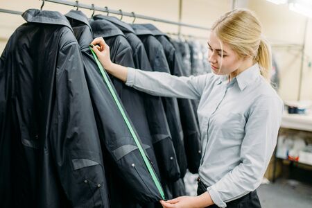 Clothes designer measures length sleeve jacketの写真素材