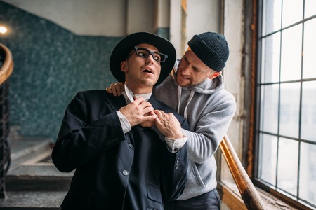 Aggressive addict with knife attack his victimの写真素材