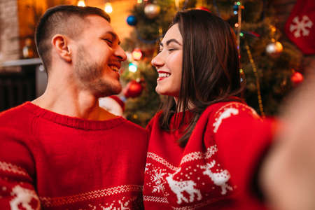 Love couple makes selfie, Christmas celebrationの写真素材